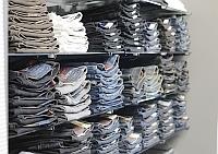 Denim jeans sorted on a shelf