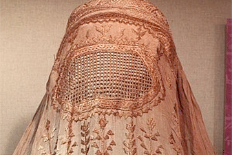 Embroidered orange burqa being worn