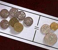 Coins on a grid with an equals sign