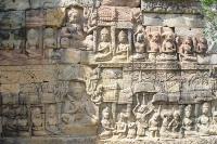 Bas-relief of figures on a wall of Bayon Temple