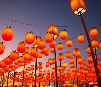 Orange lanterns lighting up night sky