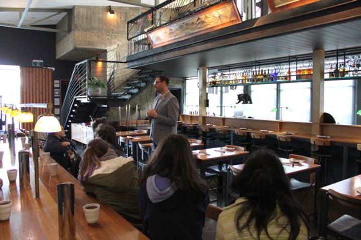Andre Bishop shares his Japan story with students at Kumo Izakaya restaurant